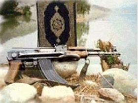 Коран и автомат. Фото: с сайта Кавказ-Центр".