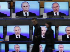 Путин в телевизоре. Фото: PolitRussia.com