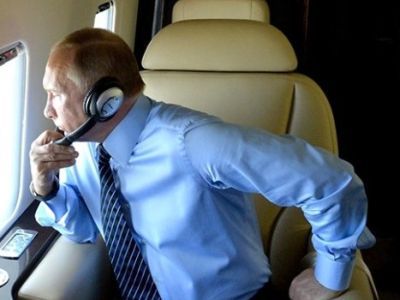 Путин в самолете. Фото: kremlin.ru